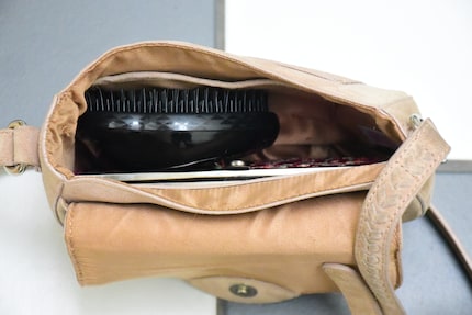 Even my smallest handbag is big enough to fit the Tangle Teezer.