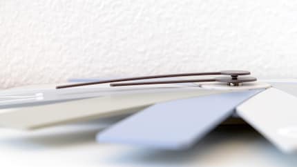 The hours and minutes hands brush slightly when passing each other.