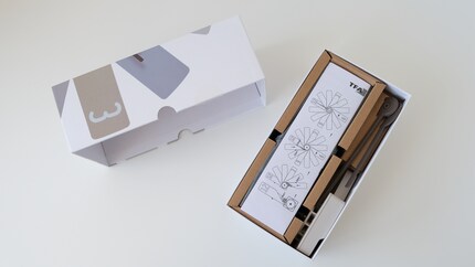 The Clock in the Box arrives in a compact box.