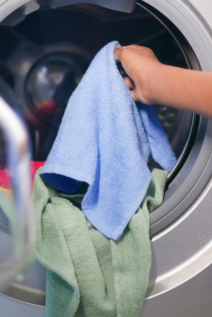 Fabric softener makes it harder for towels to absorb moisture.