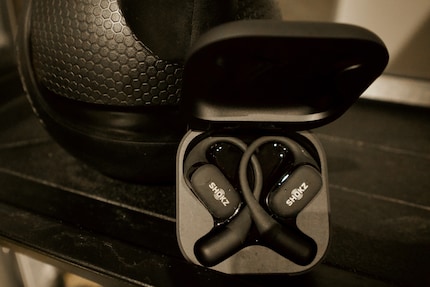 I take the charging box to the gym where it takes five minutes to provide the headphones with power for one hour.