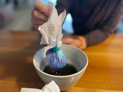 Put the egg candy in the vinegar bath.
