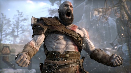 Simon, pictured here playing God of War.