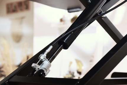 ... it activates the gas pressure spring and the monitor stand can be easily raised and lowered.