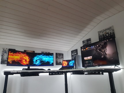 Raphael’s cable management with a height-adjustable L-shaped desk.