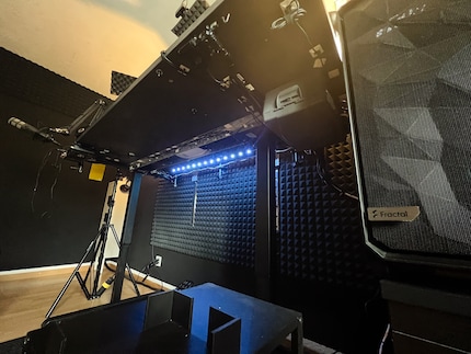 Looking under the table: the cables are neat and permanently attached.