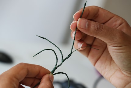 There’s room for several small flowers on this wire structure.