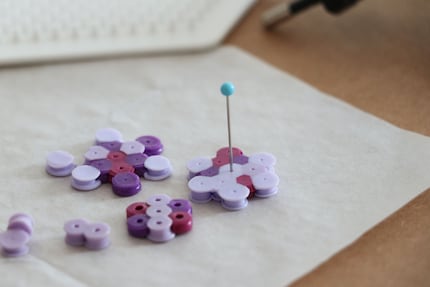 If the middle bead opening has melted shut, a needle will help.