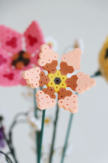 If it’s just a single bead connecting the petal to the flower basket, the structure is particularly fragile.