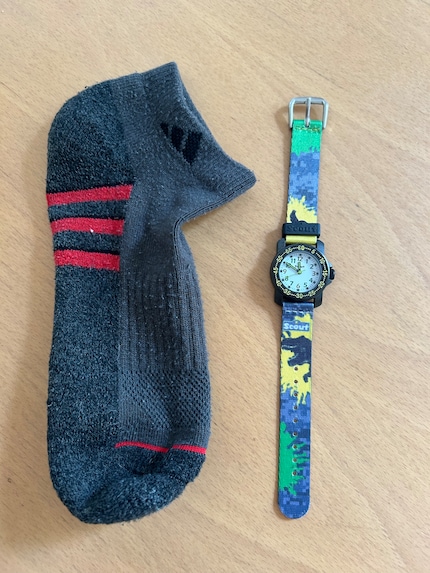 First I put the watch in a stocking...