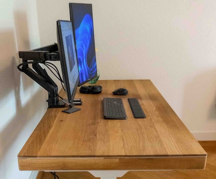 Jonathan’s PC is built into a wooden desk.