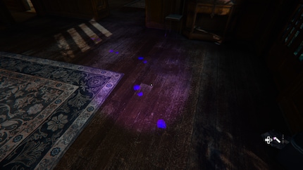 I search my base for clues using a black light.