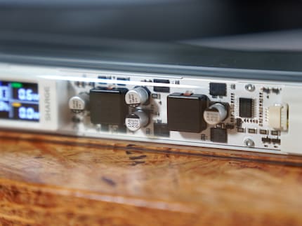 The transparent plastic cover allows you to look at the components.