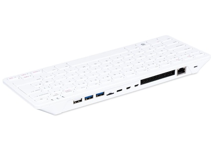 The ports are located on the back of the keyboard.