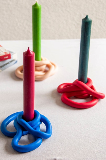 The rich colours of the polymer clay complement the colourful candles perfectly.
