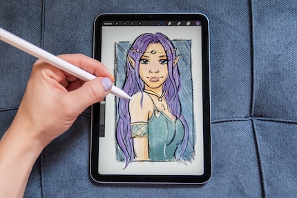 The iPad mini serves as a digital sketchbook on the go.