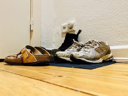 Das alte Schuhchaos neben der Wohnungstür.