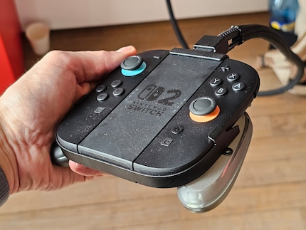 The Joy-Con in the charging grip
