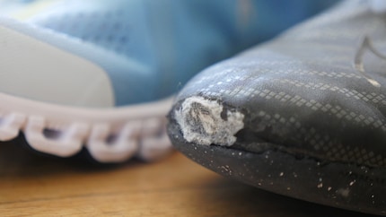 This shoe is past its best. Obviously, cutting it open at the front would also have been a solution.