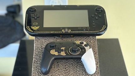 The Wii U’s gamepad is significantly chunkier than conventional controllers. For comparison, here’s the Switch Pro Controller.