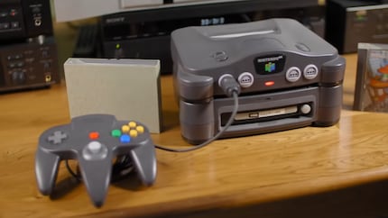 The 64DD is connected like an extension under the console to play floppy disks instead of cartridges.