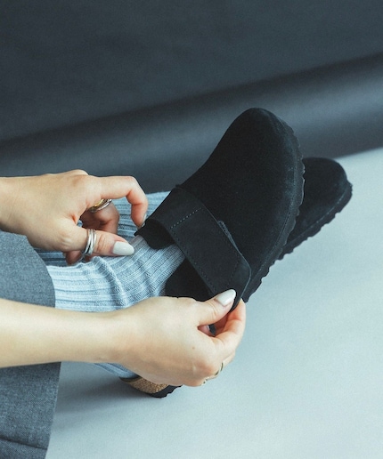 The shoe has a minimalist and modern look.
