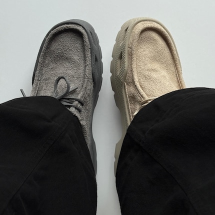 Crocs or Clarks? Hard to say from a bird's eye view.